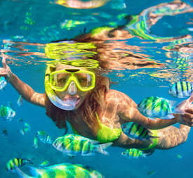 little girl snorkeling