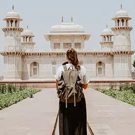 Woman in front of a castle