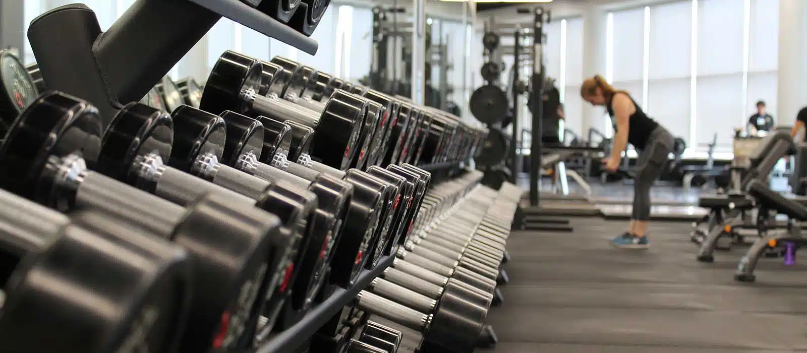 Gym with lady working out