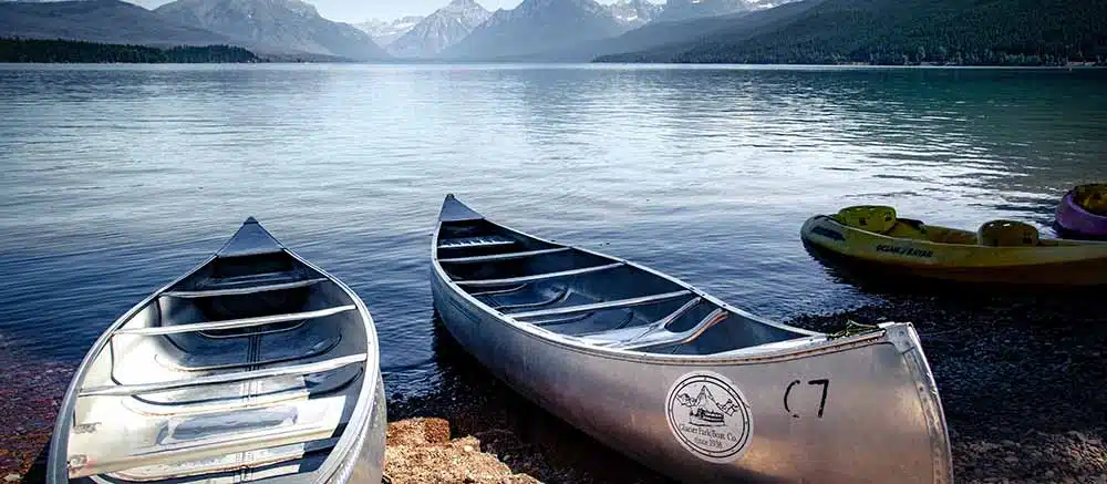 Canoes resting lakeside