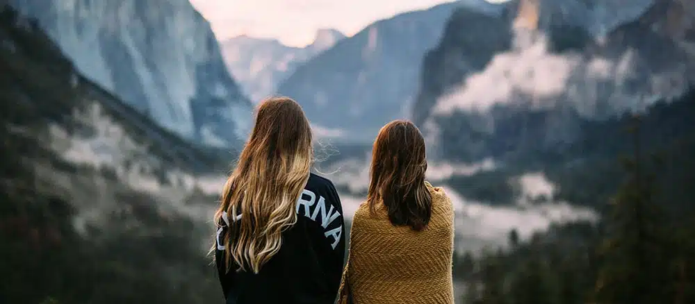 Girl scouts looking at mountain view