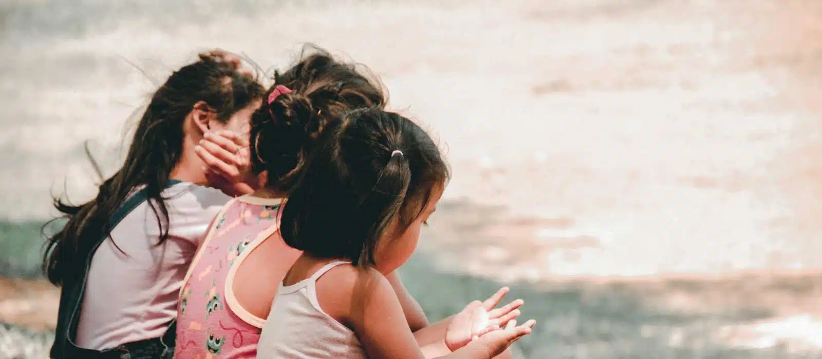 3 girls sitting at side angle view - kids