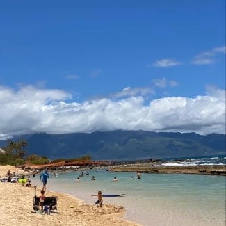 Head to Baby Beach in Paia (Great for kids of all ages)