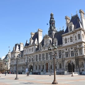 Saunter past the Hotel de Ville (City Hall)