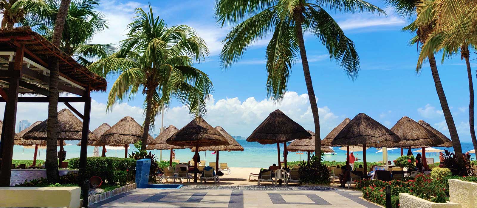 shady palapas on a cancun beach
